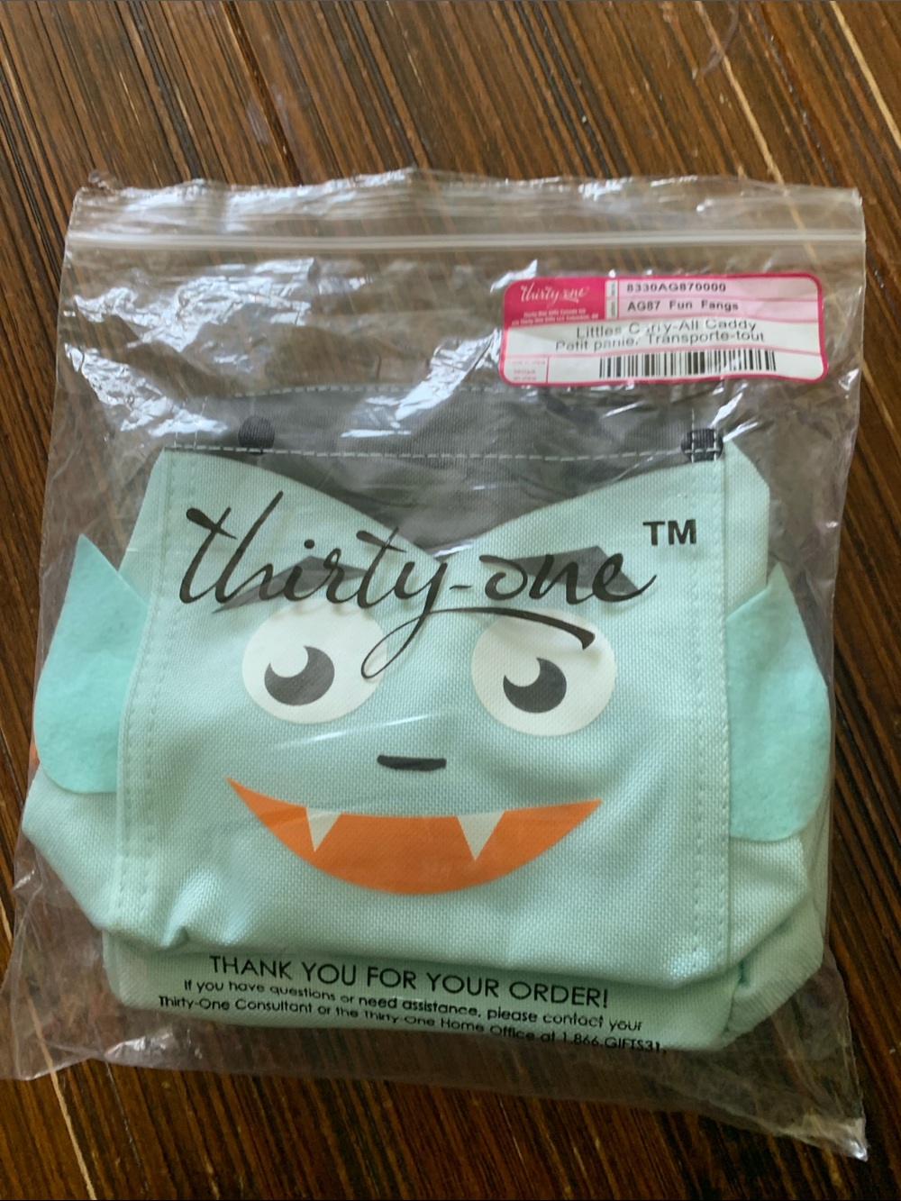Thirty-one Mint Green Monster Caddy with Orange Fang Detail